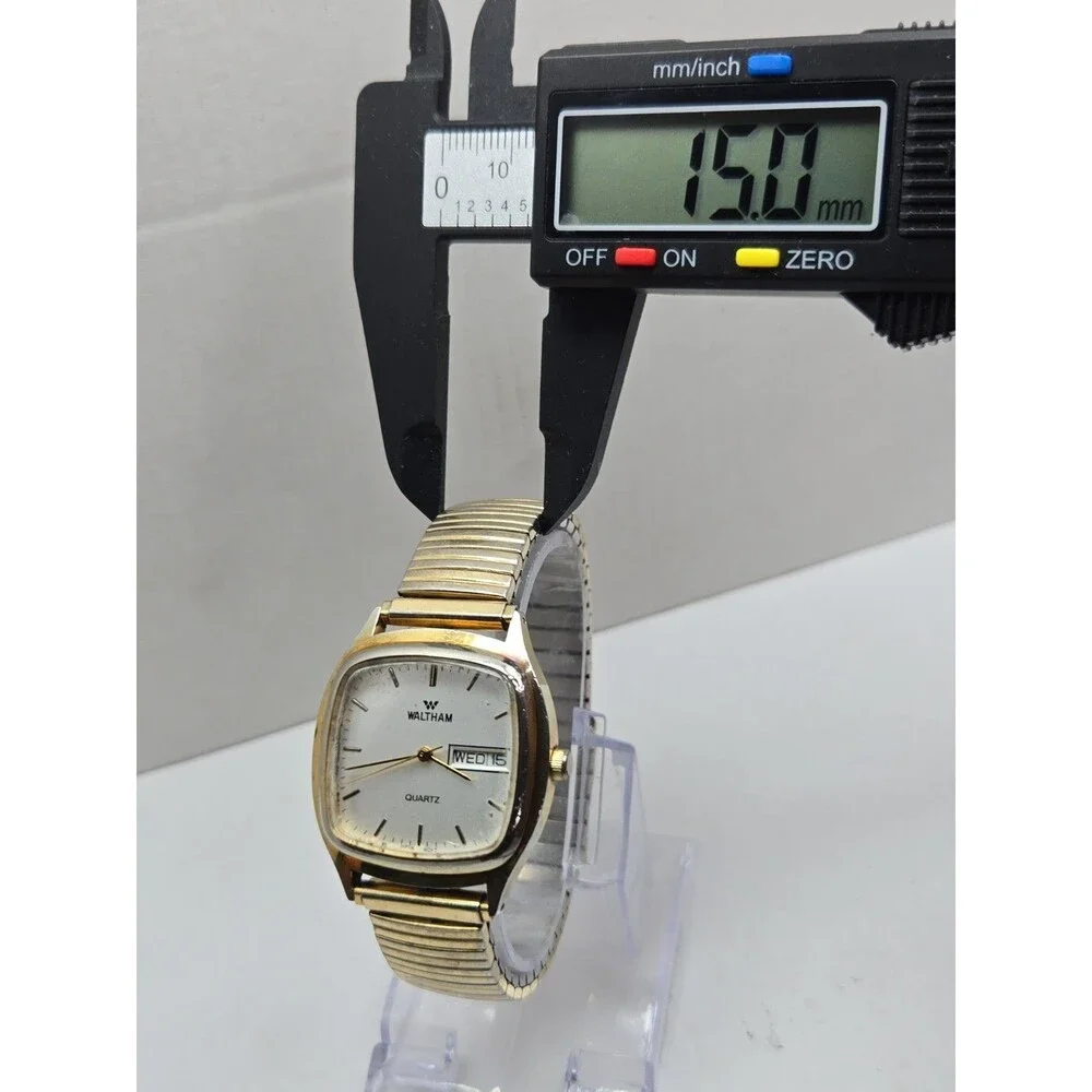 Waltham Vintage Quartz Watch Day Date Gold Tone Square Case Stretch Band